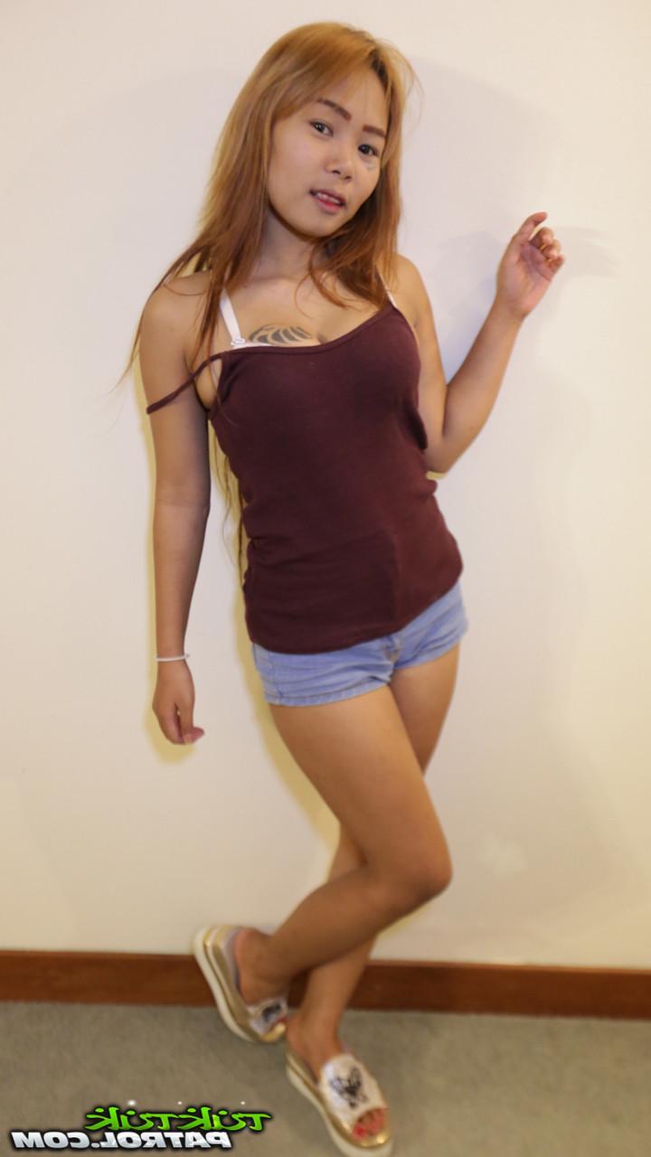 20P Asian hottie Aom V shows off her inked body and gets a good POV pounding