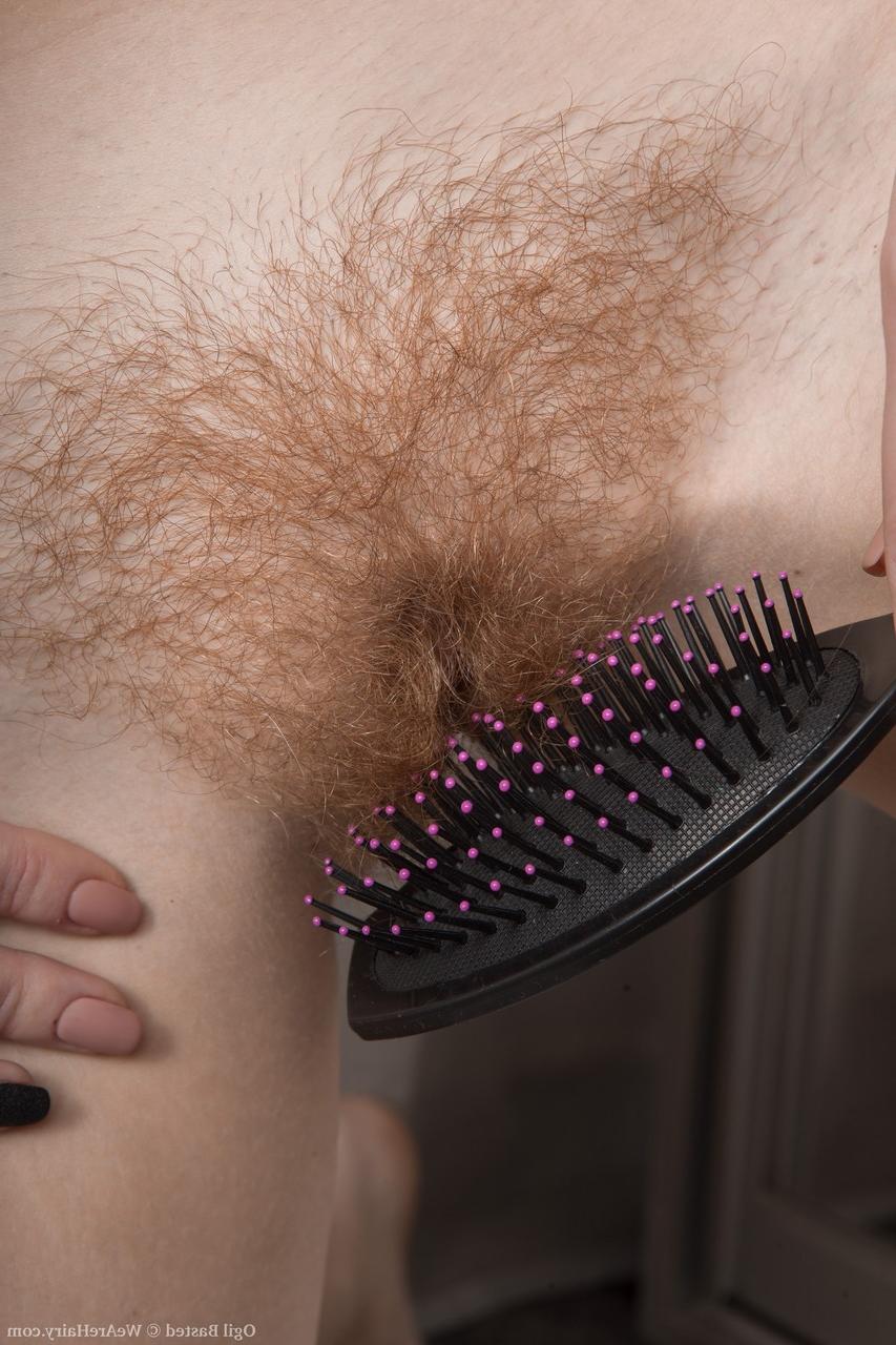 18P Adorable redhead with nice titties Ogil Basted combs her vagina pubes