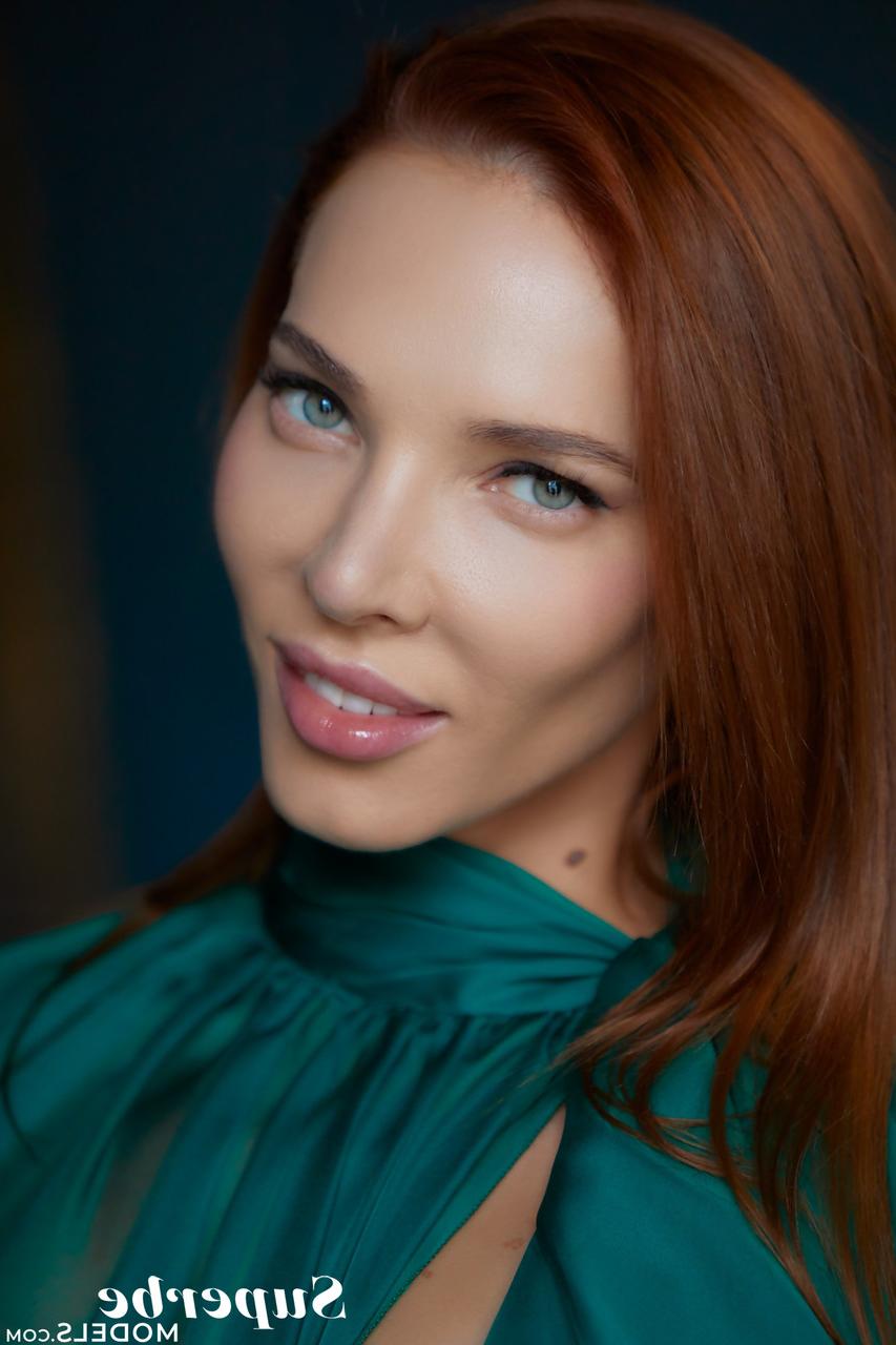 20P Stunning redhead with puffy nips Mia Aria flaunts her body in a solo