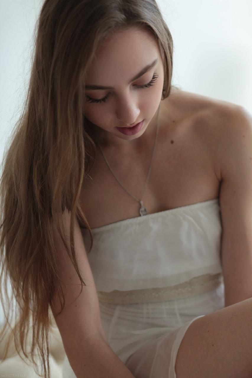 20P Brunette beauty Valery Leche slowly unveils her slim body in a solo
