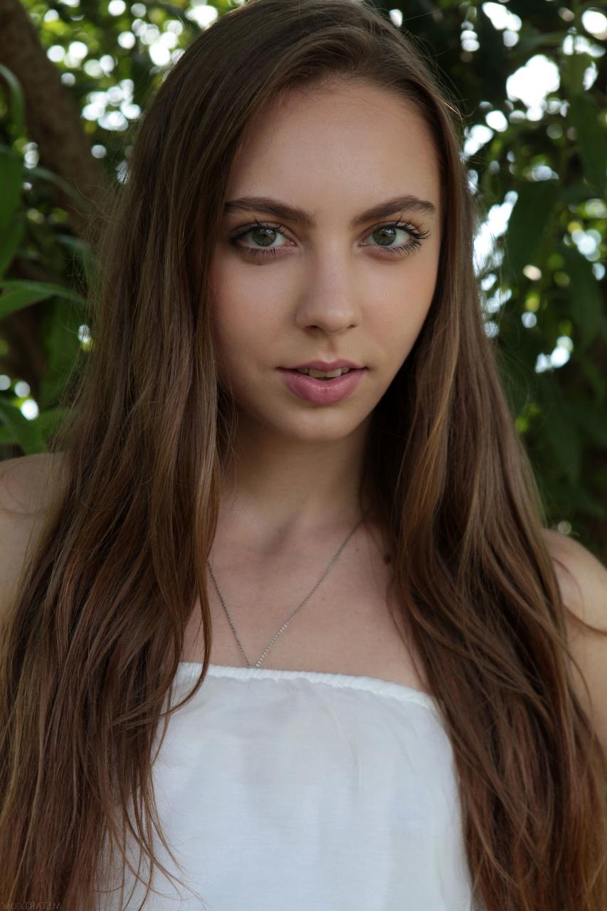 20P Brunette beauty Valery Leche slowly unveils her slim body in a solo