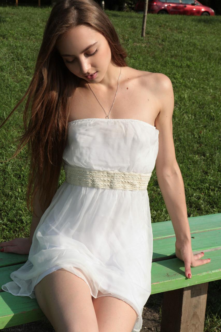 20P Brunette beauty Valery Leche slowly unveils her slim body in a solo