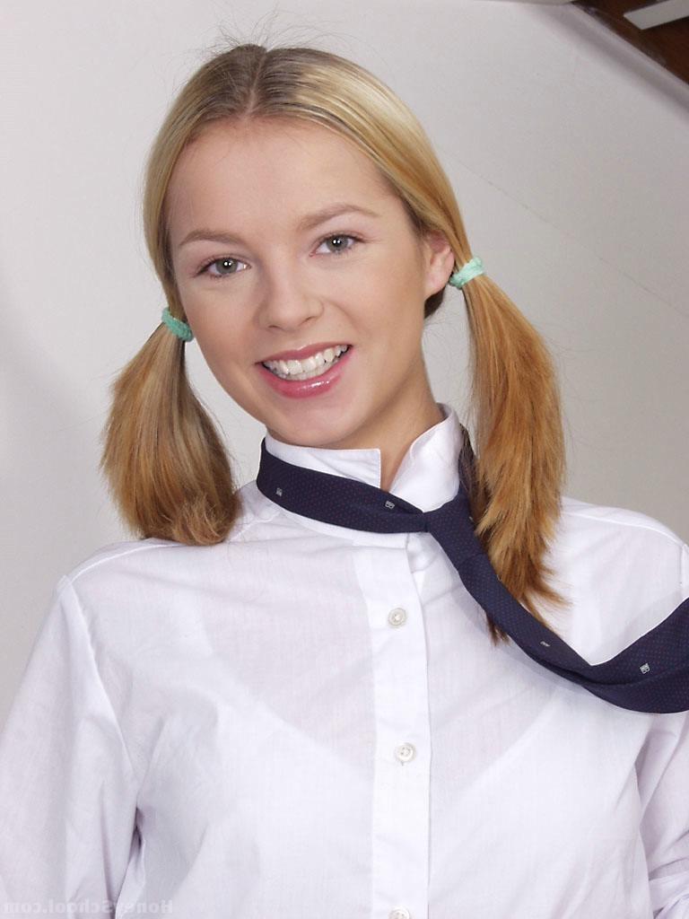 20P Pretty schoolgirl Andrea Mirage spreads her tight pussy up close