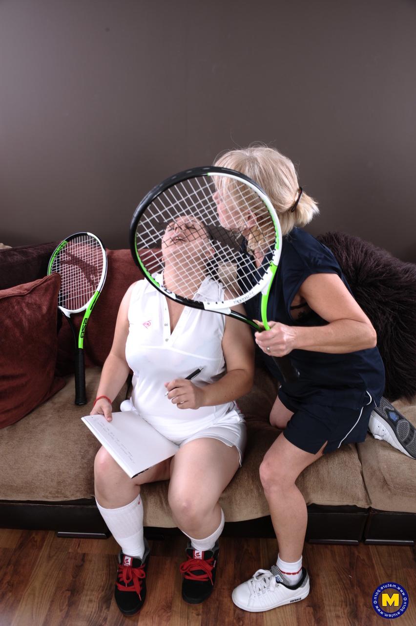 20P Mature coach with big tits spanks & toys lesbian tennis player Kimberly's muff
