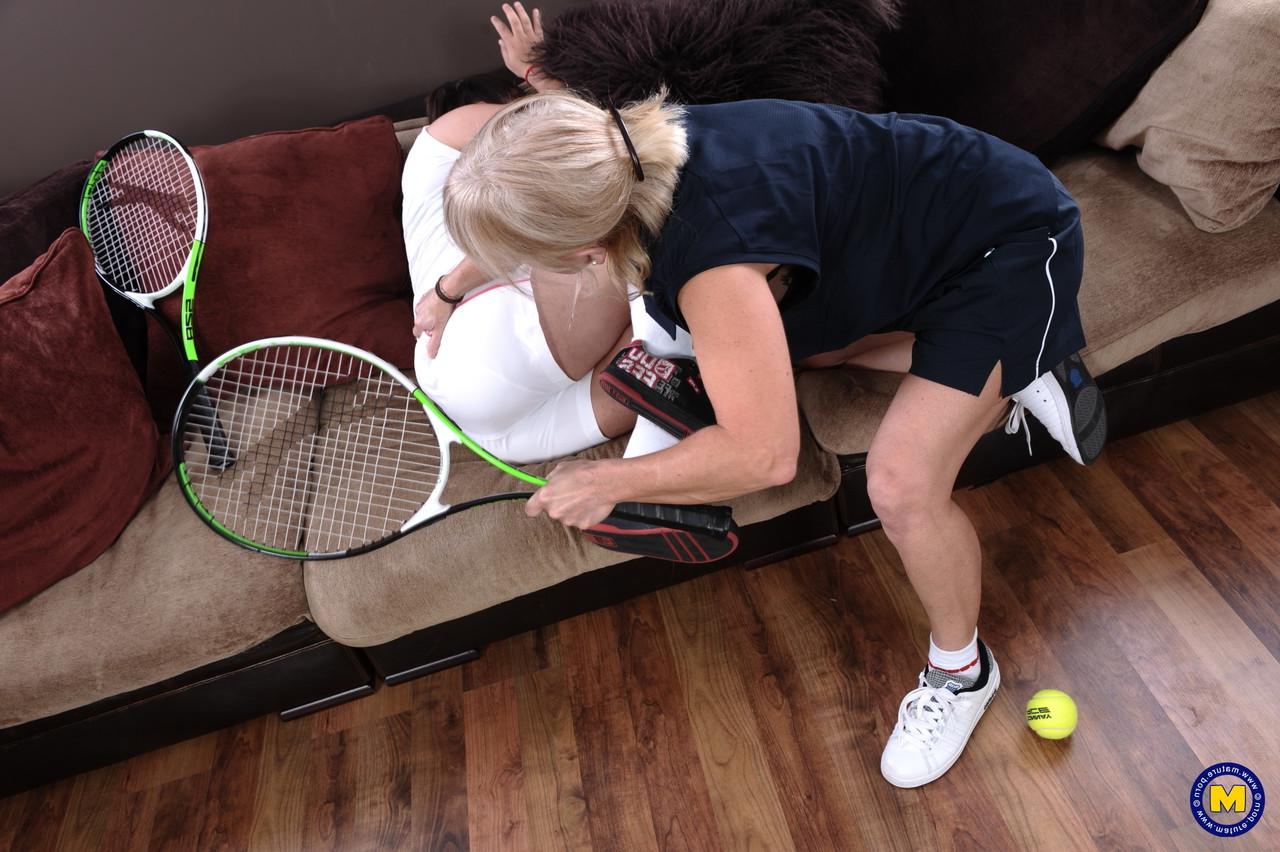 20P Mature coach with big tits spanks & toys lesbian tennis player Kimberly's muff