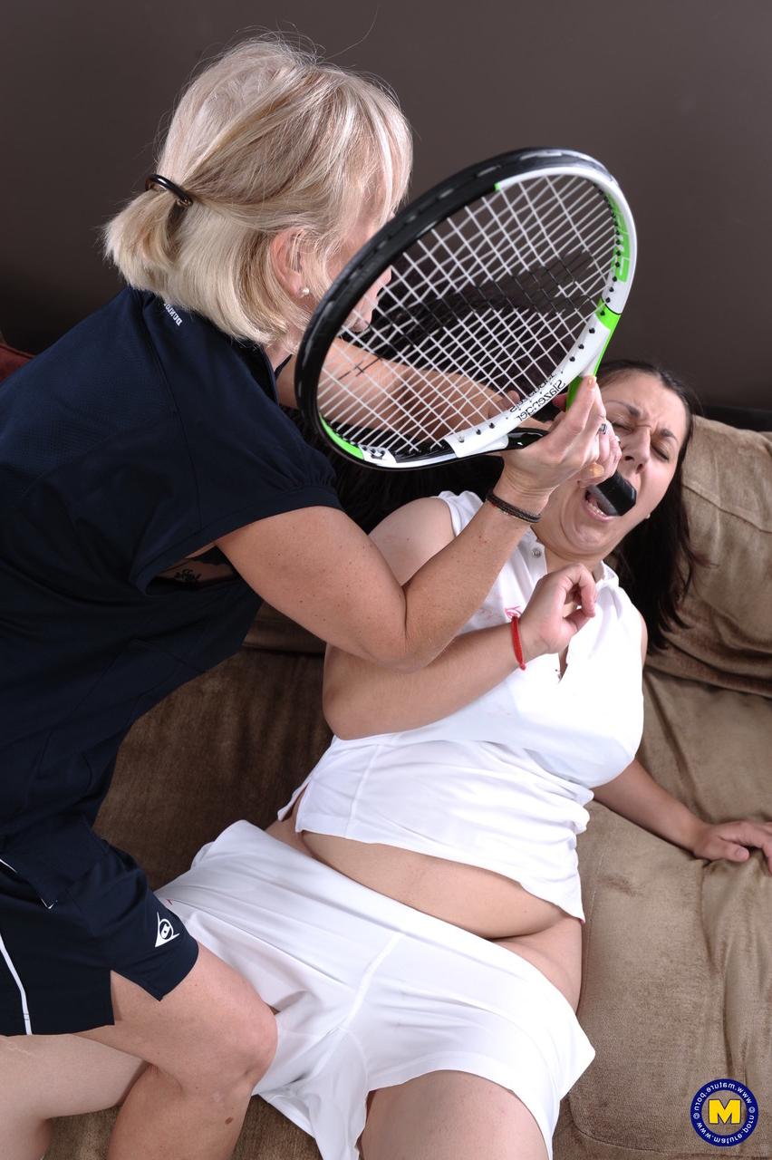20P Mature coach with big tits spanks & toys lesbian tennis player Kimberly's muff
