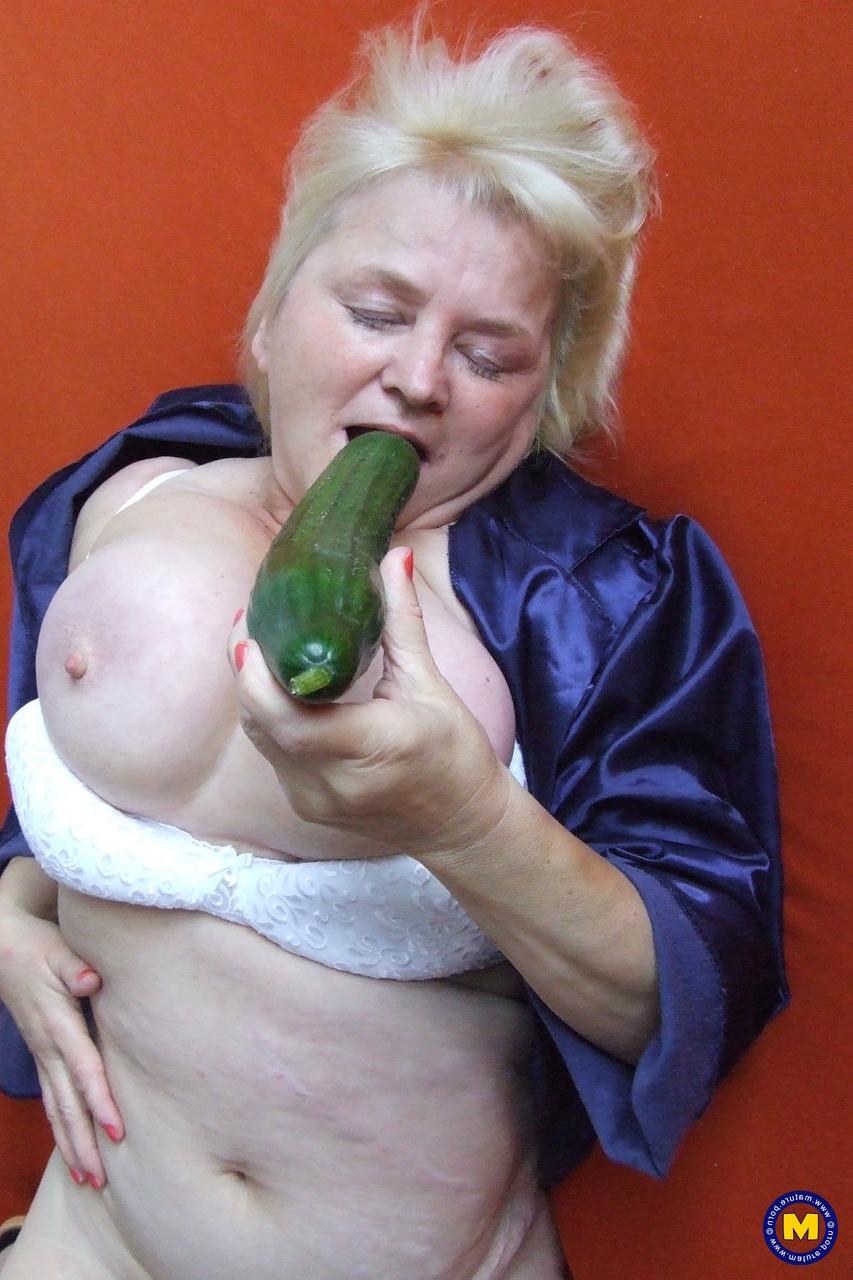 20P Blonde granny Agnes shows her juicy bosom and masturbates in a solo