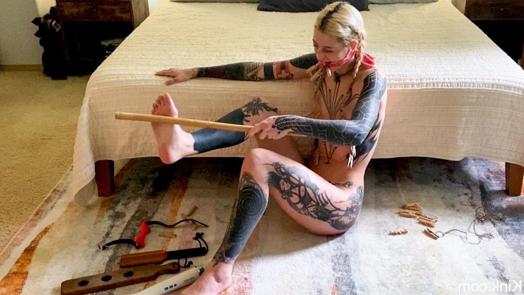 18P Slender babe with tattoos Cam Damage tries out bondage tools on the floor