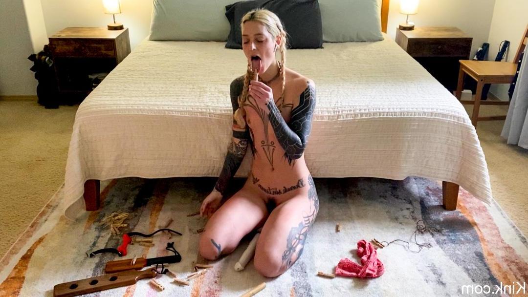 18P Slender babe with tattoos Cam Damage tries out bondage tools on the floor