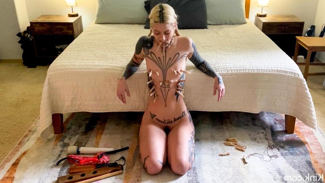 18P Slender babe with tattoos Cam Damage tries out bondage tools on the floor