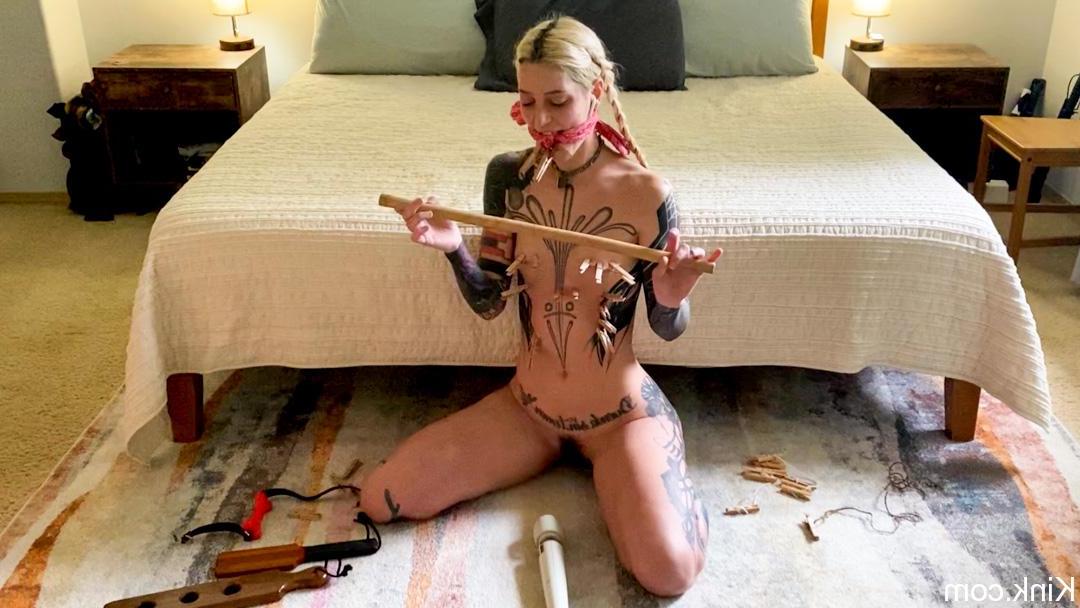18P Slender babe with tattoos Cam Damage tries out bondage tools on the floor