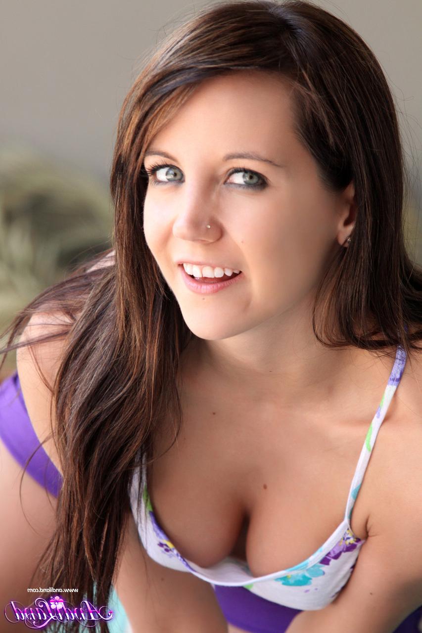 15P Pretty teen Andi Land sex on a glass dildo while getting undressed