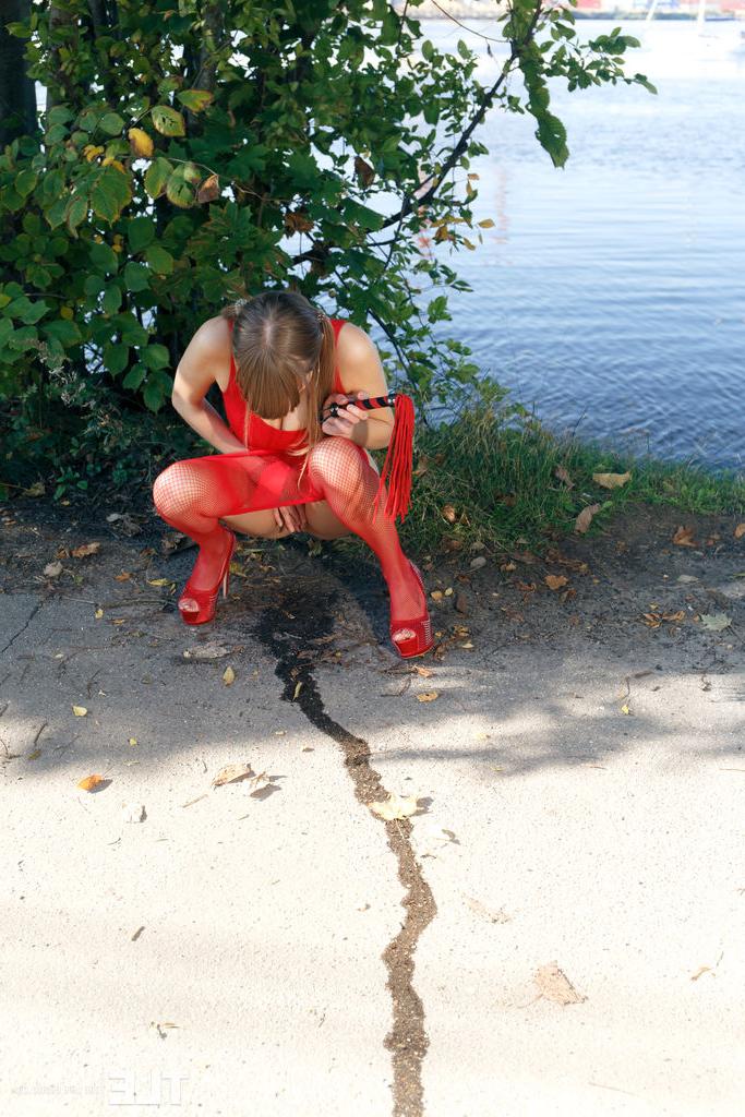 16P Pretty Natalie Russ in pigtails outside toying pussy in red sheer pantyhose