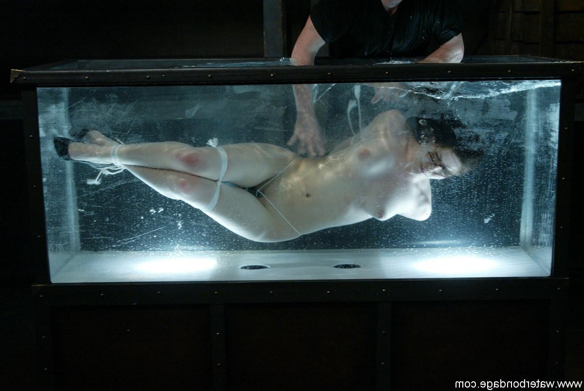 20P Brunette pornstar Bobbi Starr gets her hands tied up & gets tormented in water