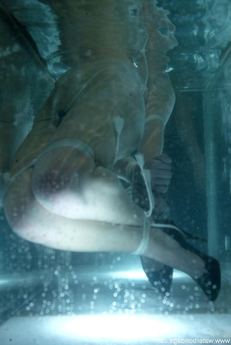 20P Brunette pornstar Bobbi Starr gets her hands tied up & gets tormented in water
