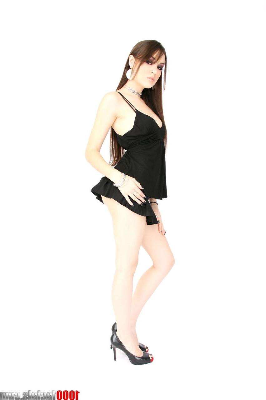 17P Sultry erotic brunette Sasha Grey flashes naked upskirt before posing naked