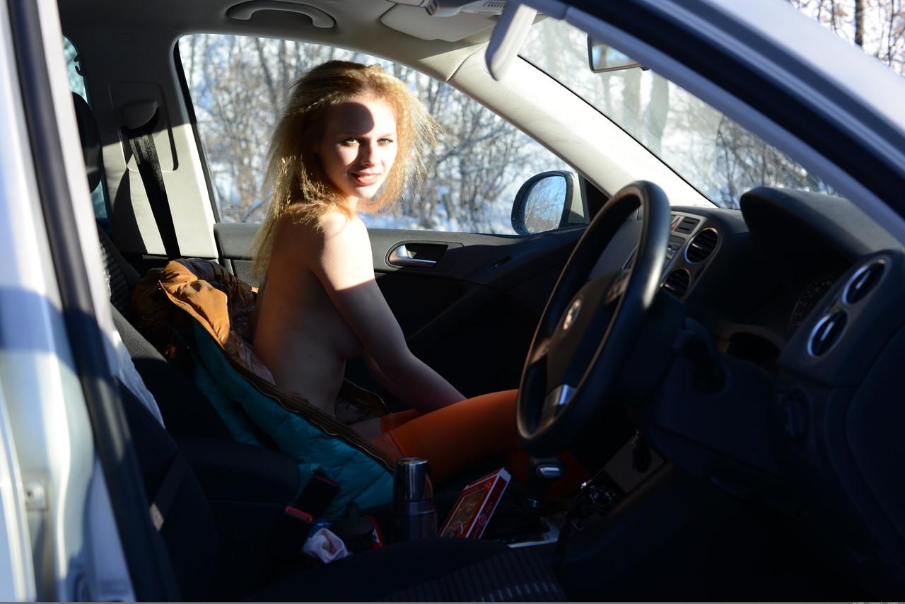 17P Cold winter day isn't a problem for skinny babe in orange stockings Angelika D