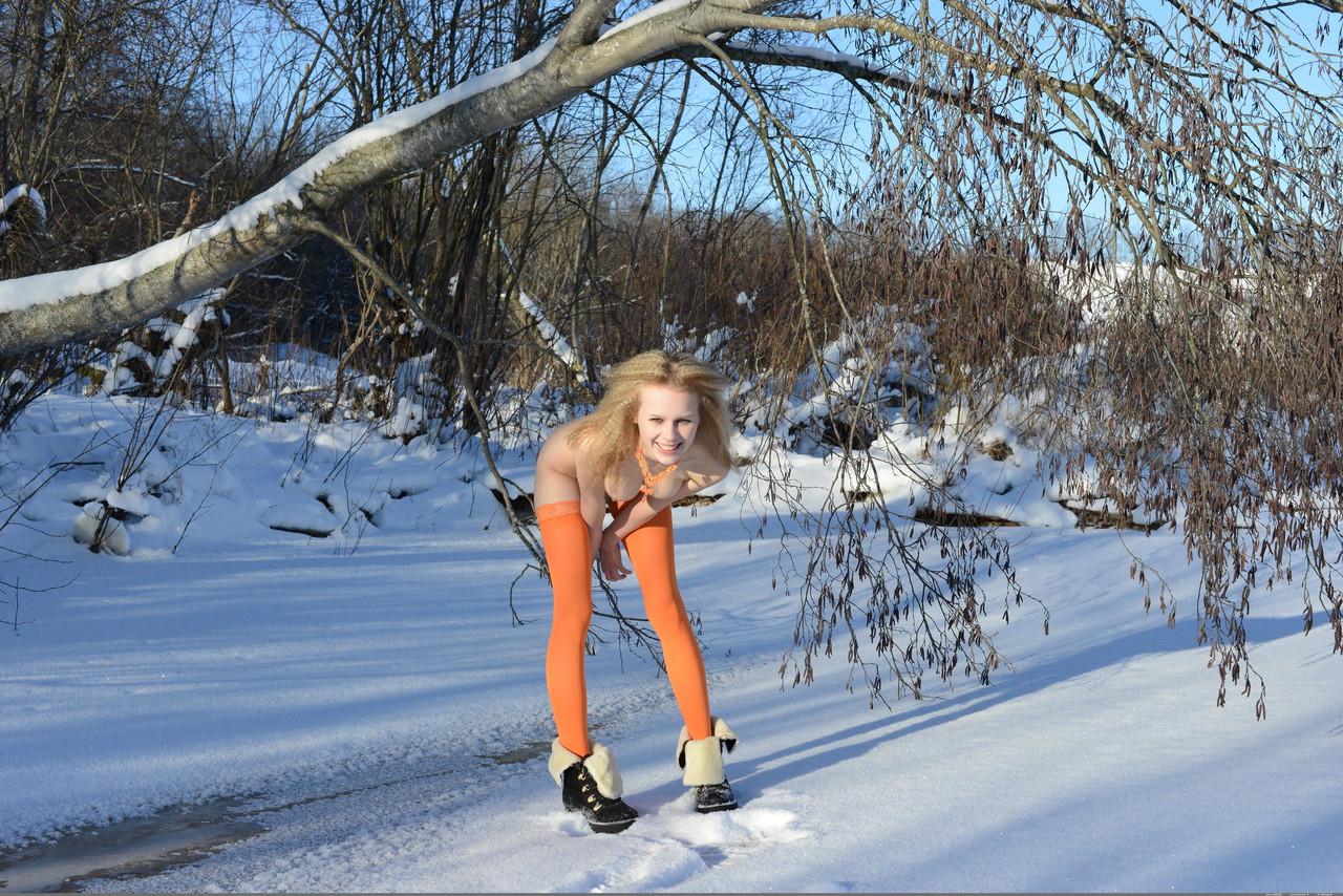 17P Cold winter day isn't a problem for skinny babe in orange stockings Angelika D