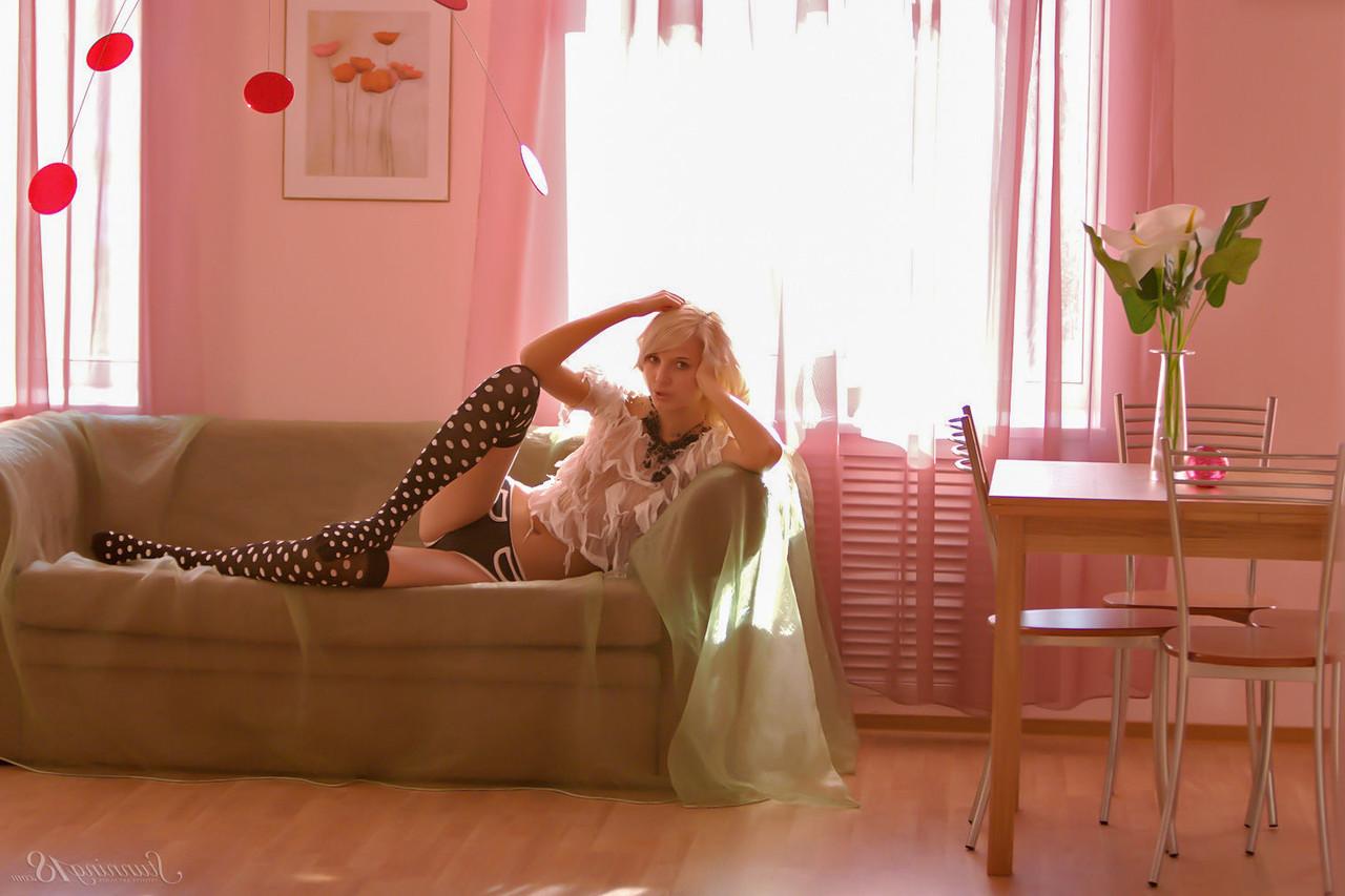 16P 18-year-old blonde Eyra U gets naked while wearing OTK polka-dot socks