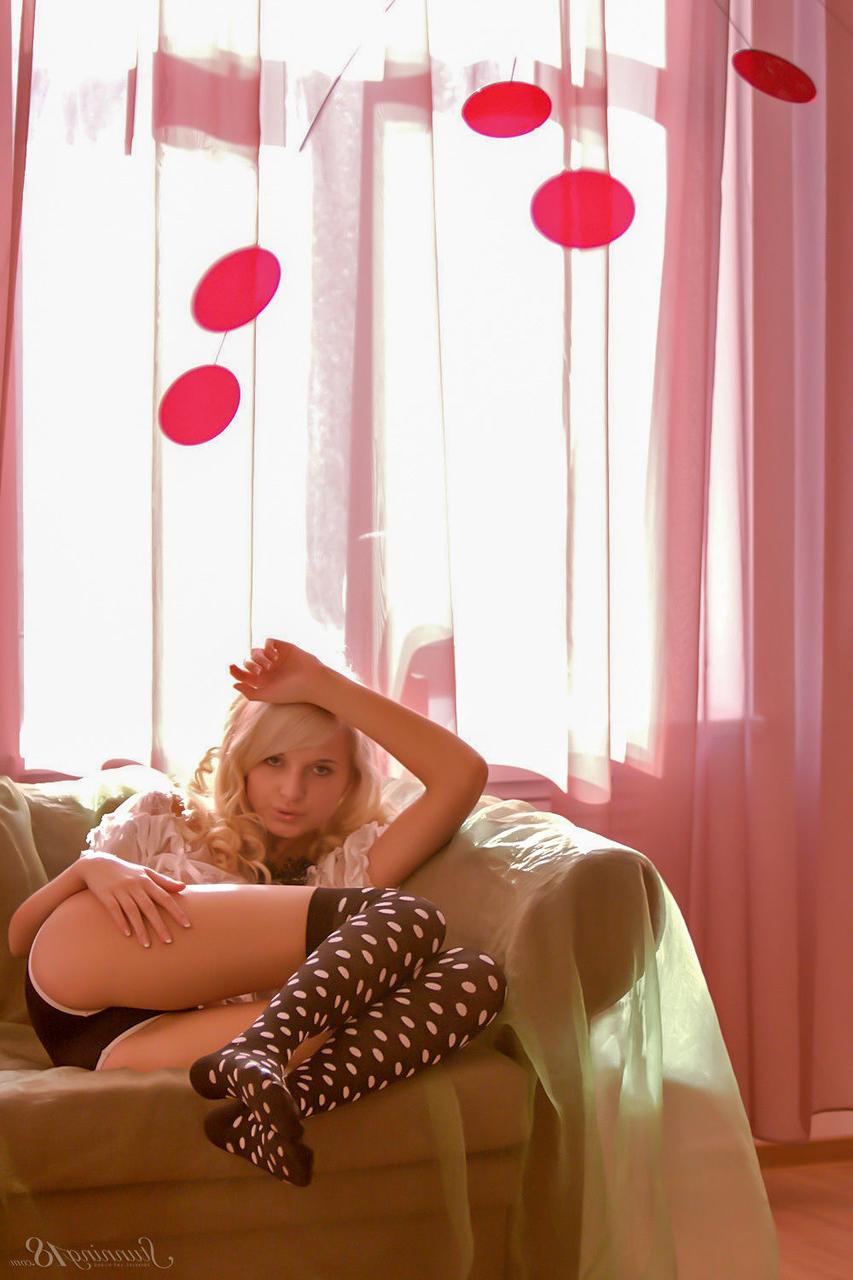 16P 18-year-old blonde Eyra U gets naked while wearing OTK polka-dot socks