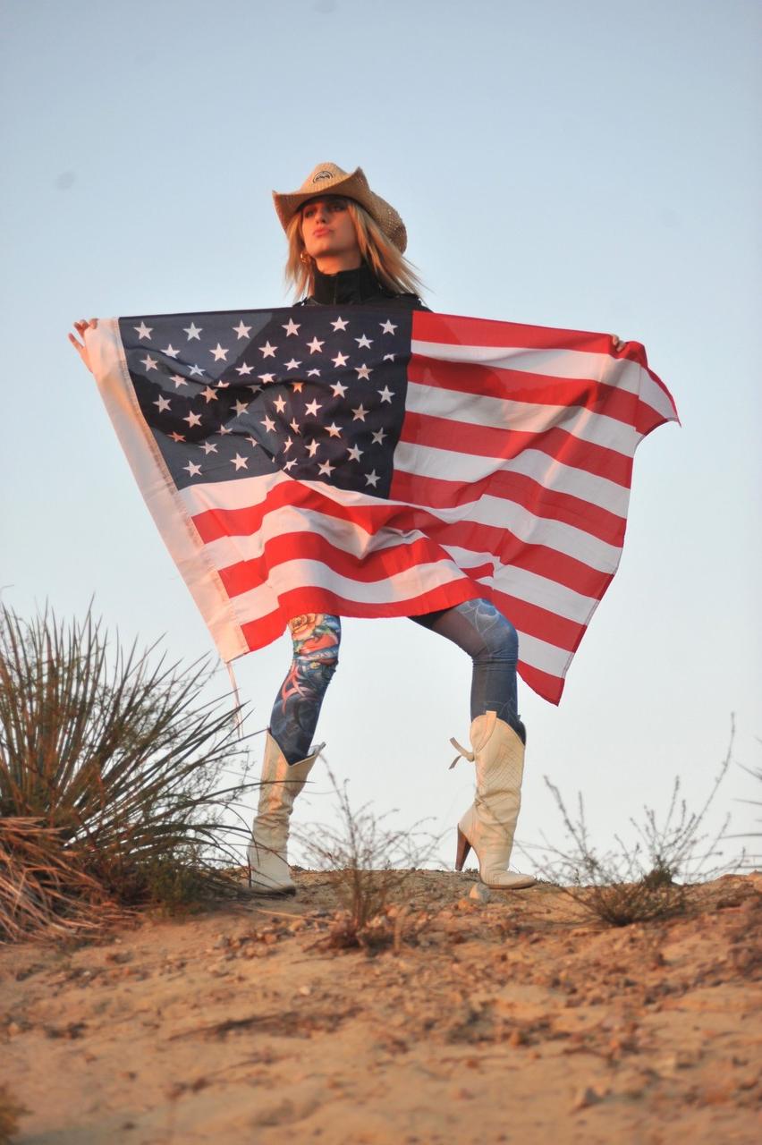 12P Blonde cowgirl Jenny shows her great tits in the bed of a pickup truck