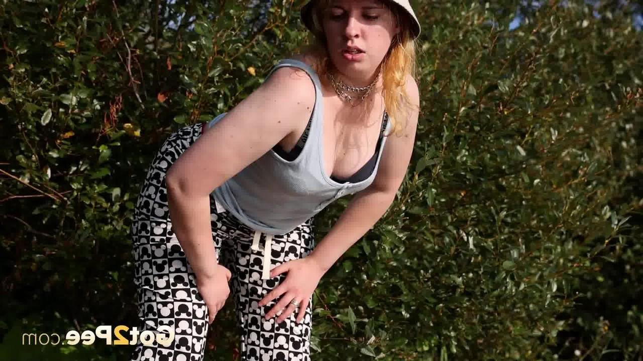 15P Caucasian girl Magnolia takes a badly needed piss near some bushes