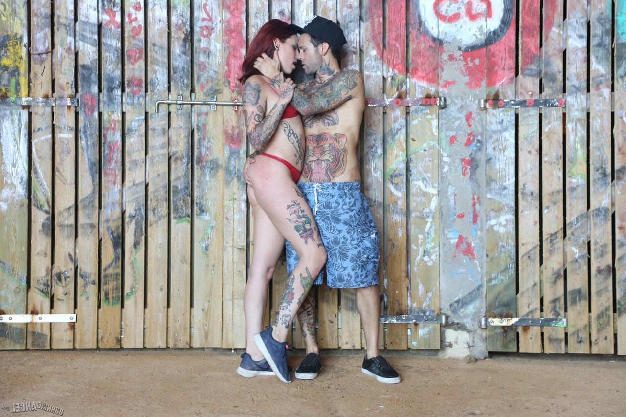 17P Gorgeous tattooed redhead babe Silvia Rubi fucking hard in the beach cave