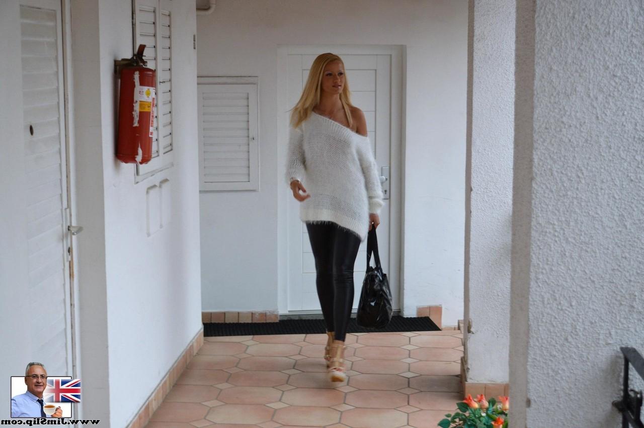 17P Tanned blonde Cherry Kiss takes off white pullover and tight black pants