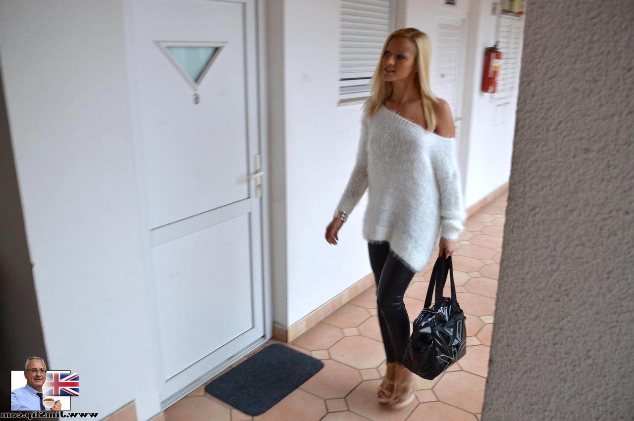 17P Tanned blonde Cherry Kiss takes off white pullover and tight black pants