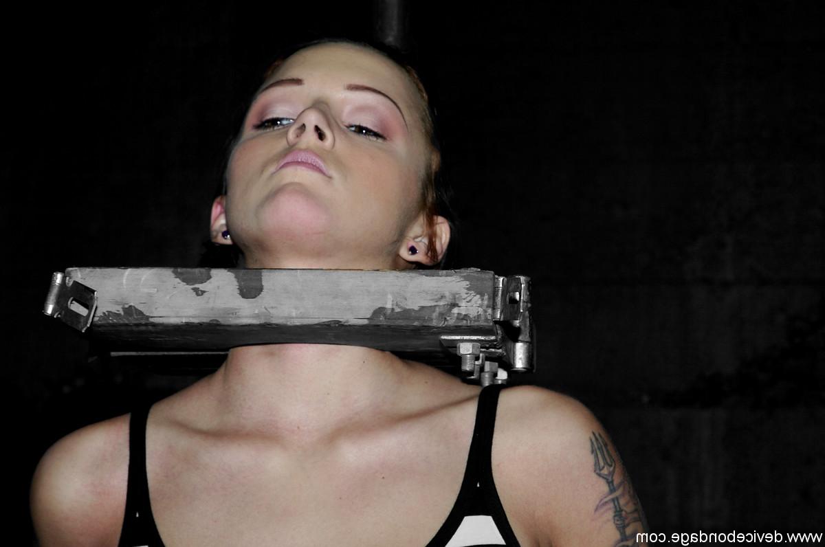 17P Unfortunate female is held in place by neck and nose restraints