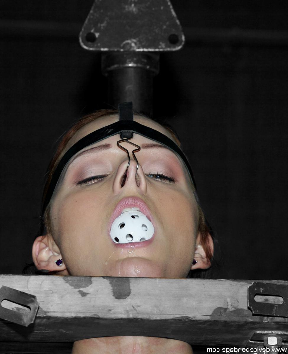 17P Unfortunate female is held in place by neck and nose restraints