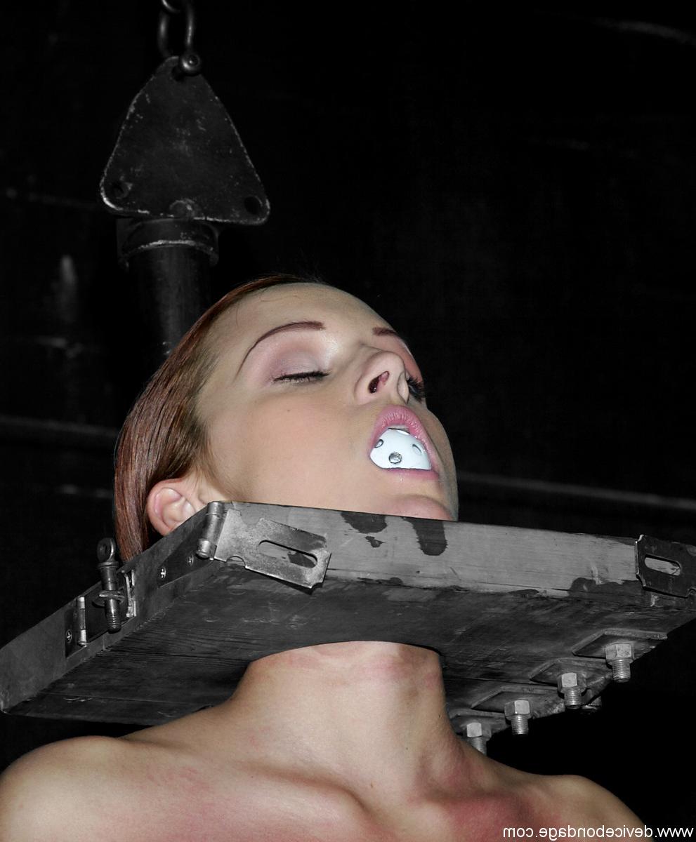 17P Unfortunate female is held in place by neck and nose restraints