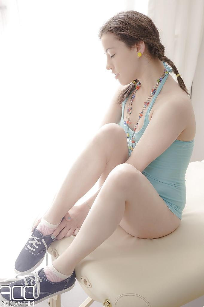 12P Sexy little Euro teen girl in pigtails gingerly removing her panties