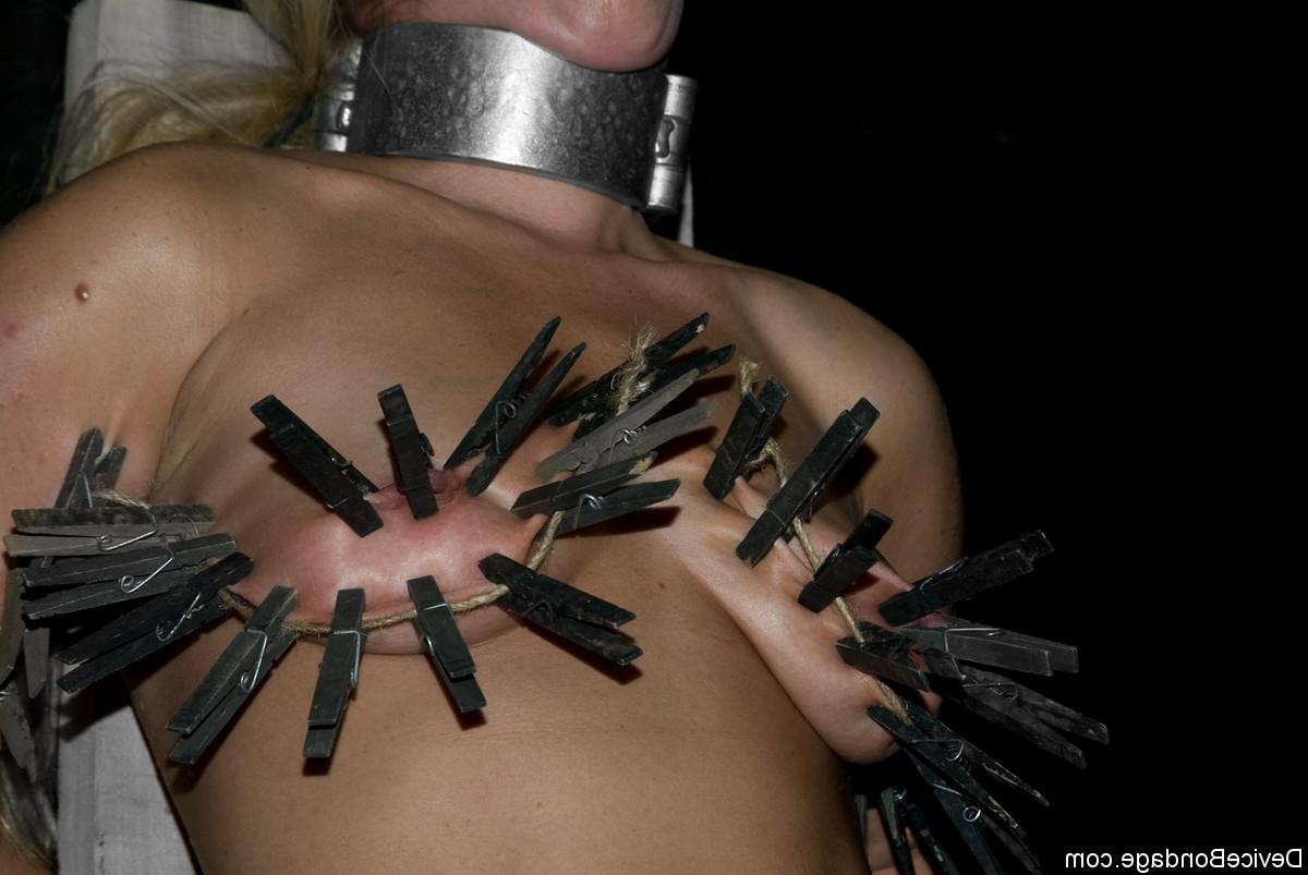 16P Naked blonde chick Dia Zerva is covered in clothespins in a dungeon