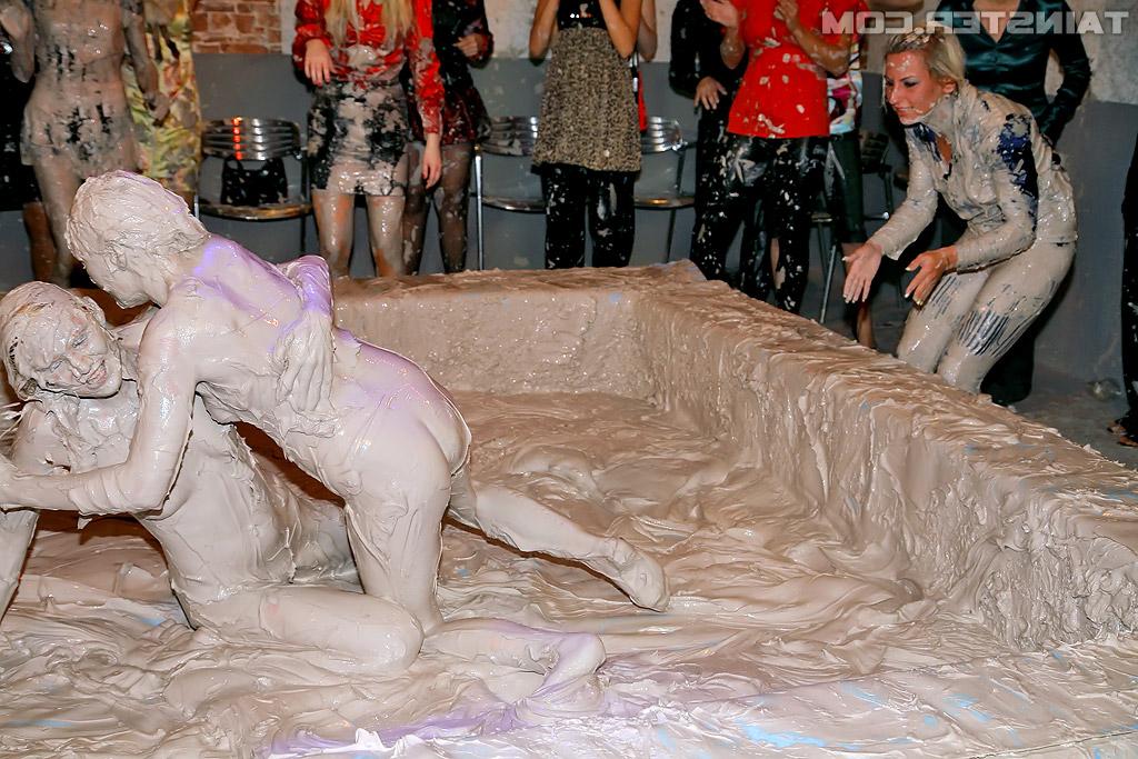 16P Sexy european fetish lady Eliss Fire is into wild and messy mud wrestling