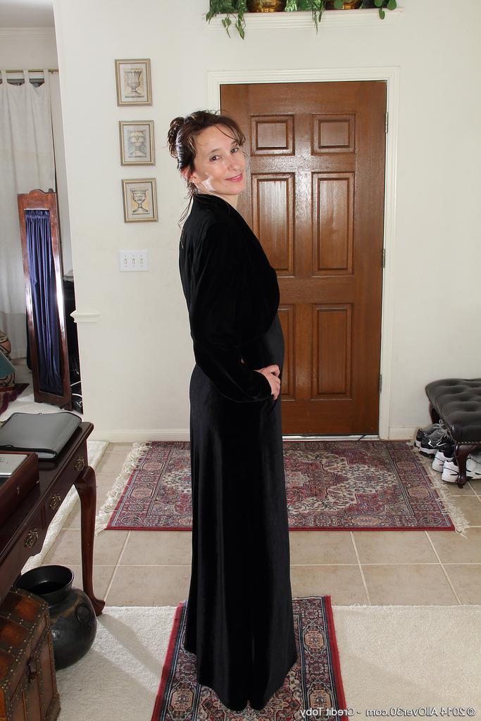 16P Classy over 30 lady Celeste Carpenter casts aside her long dress to pose nude