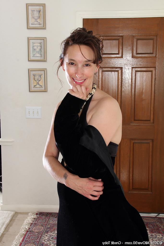 16P Classy over 30 lady Celeste Carpenter casts aside her long dress to pose nude