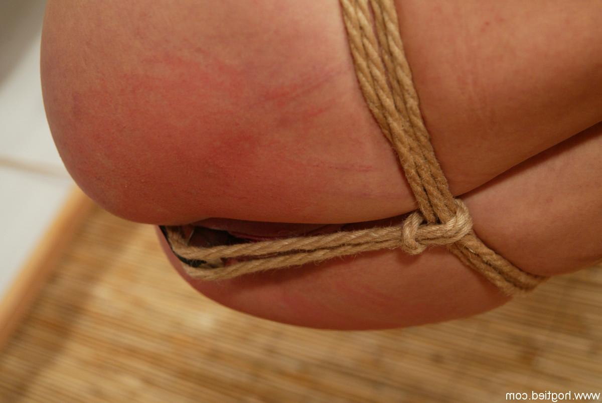 20P Naked babe Danielle endures corporal punishment in rope bondage
