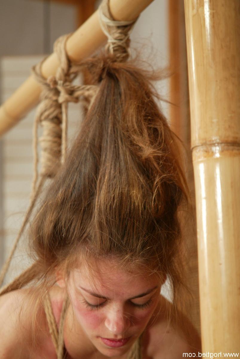 20P Naked babe Danielle endures corporal punishment in rope bondage