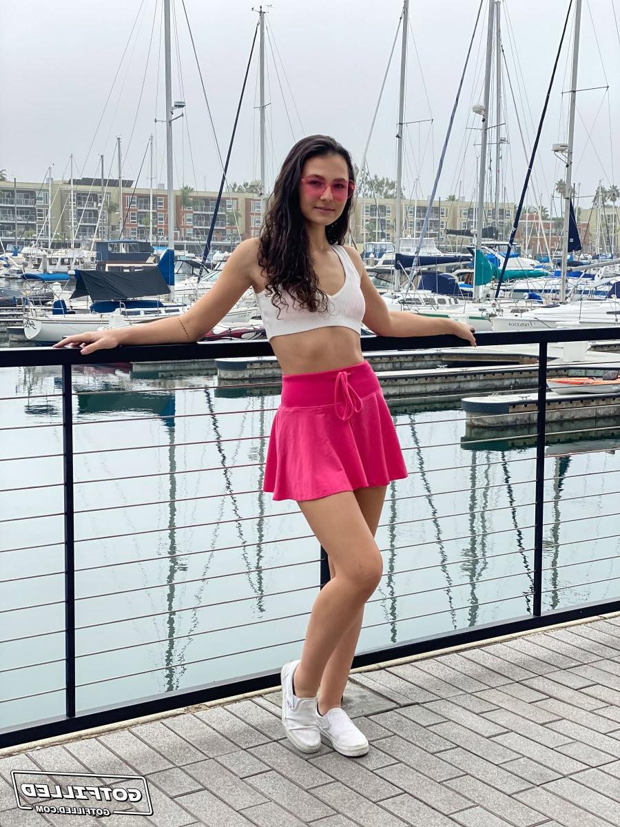 20P Young brunette Liz Jordan models a bikini at a marina before sex at home