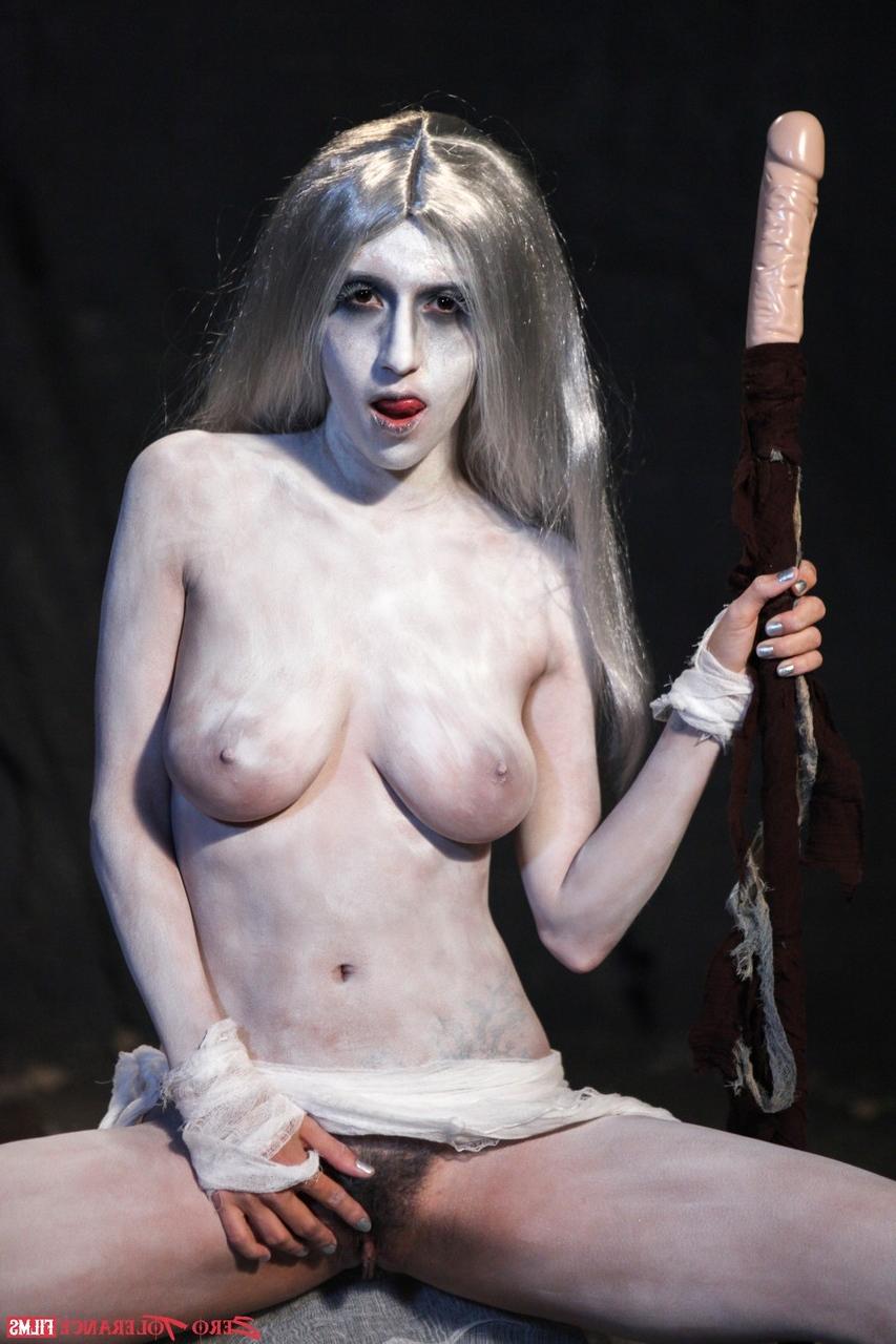 15P Blonde cosplayer April Oneil makes use of a dildo stick during solo play