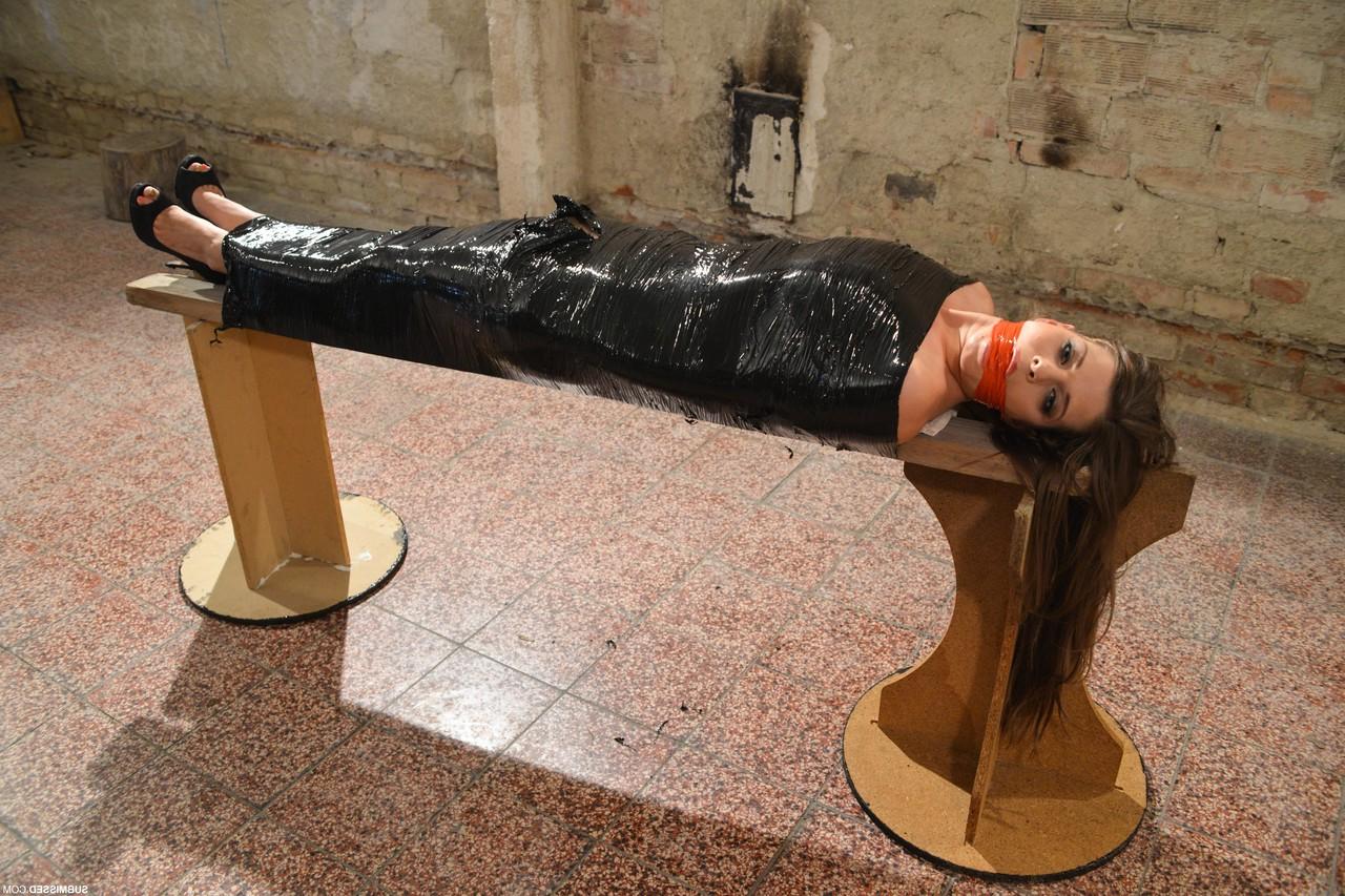 15P Sexy submissive babe with big tits Monalee gets gagged and wrapped in plastic