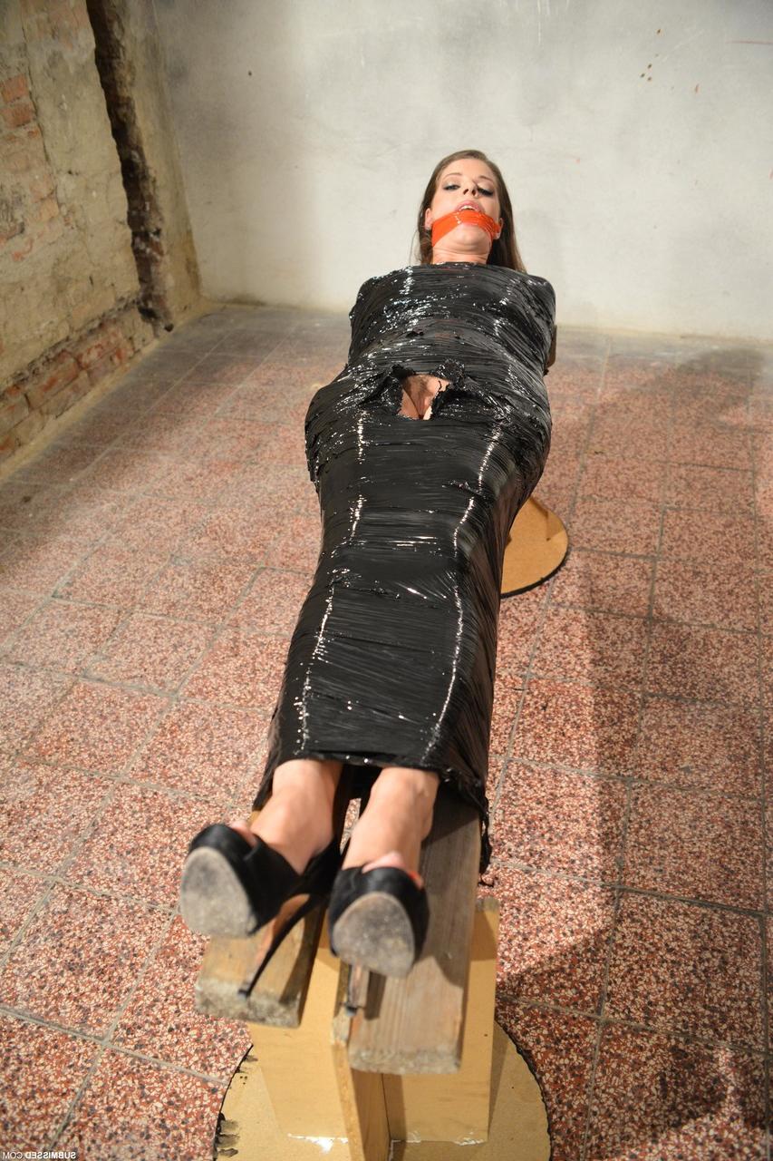 15P Sexy submissive babe with big tits Monalee gets gagged and wrapped in plastic