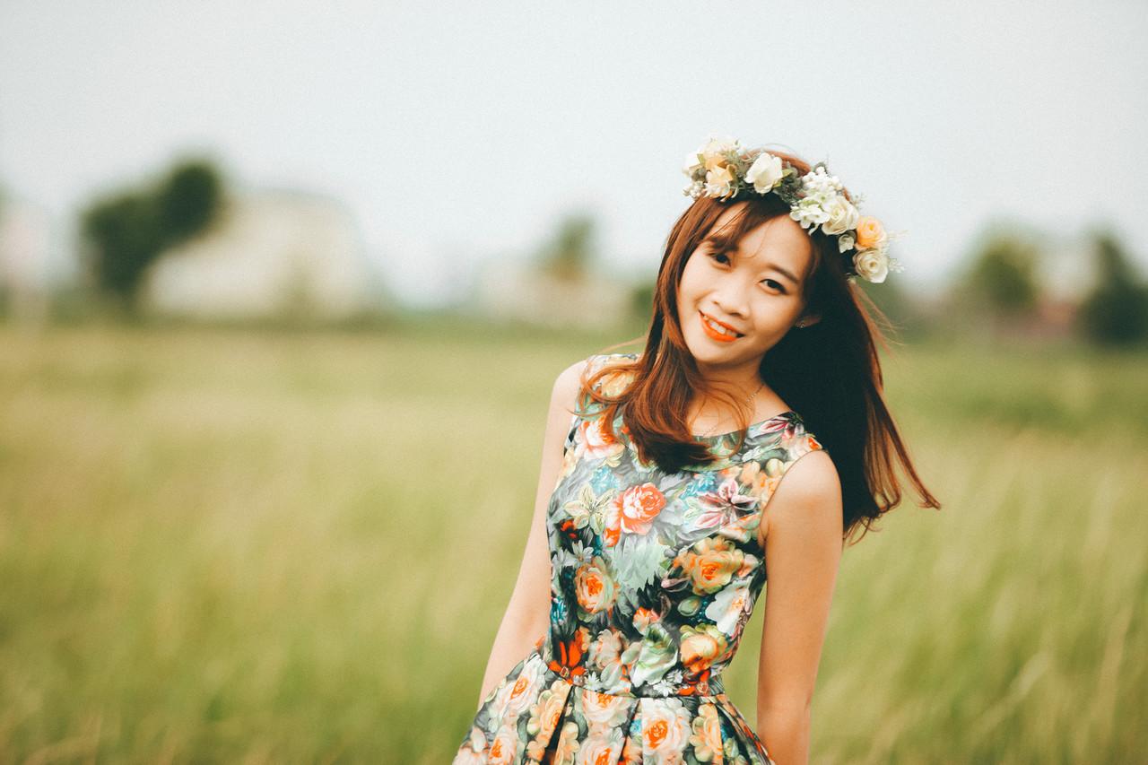 20P Cute Asian musician poses in her white dress while playing a violin outside