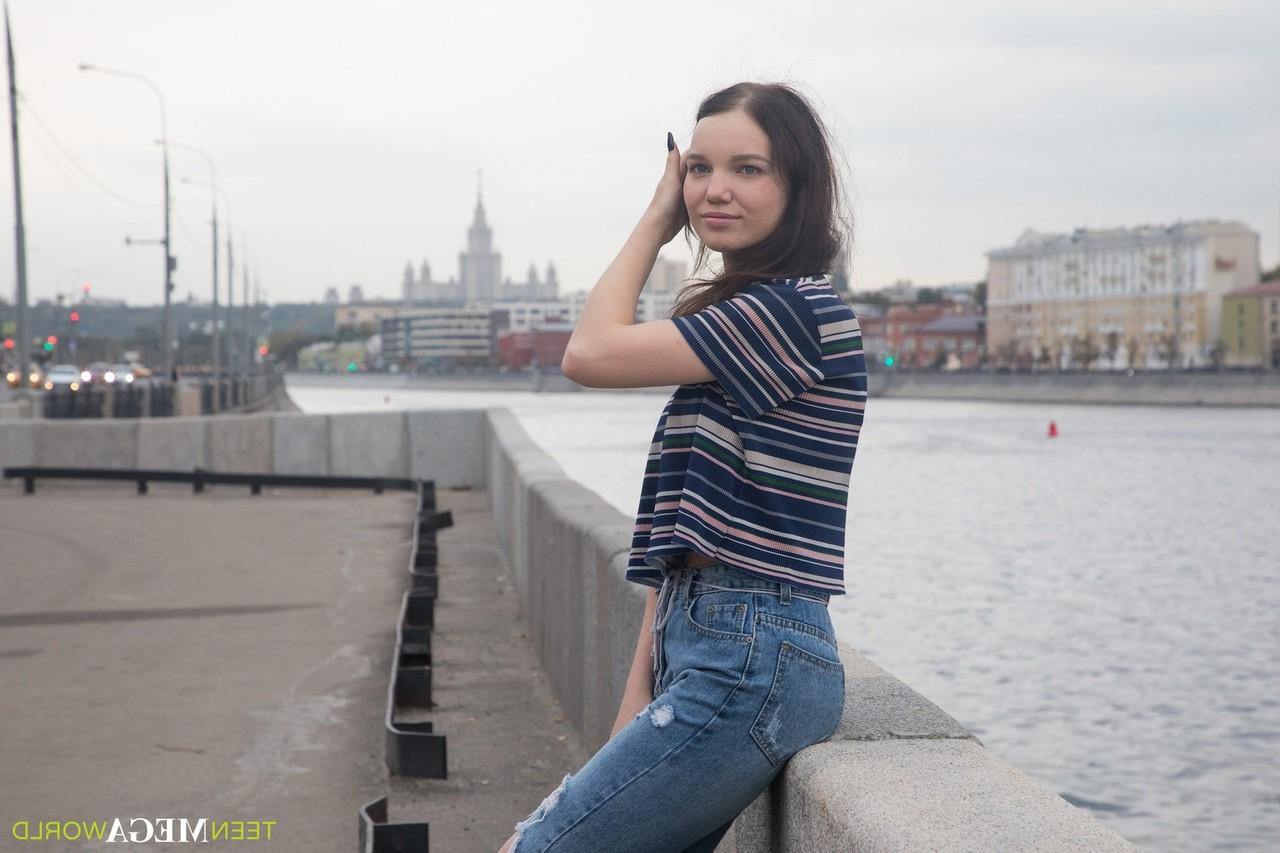 15P Young brunette Adel is left with a creampie after sex with a boy