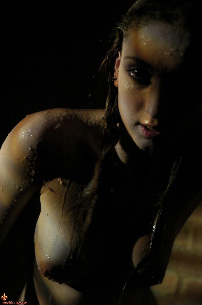 15P Sexy brunette Sissi cools off her hot body in poor lighting conditions