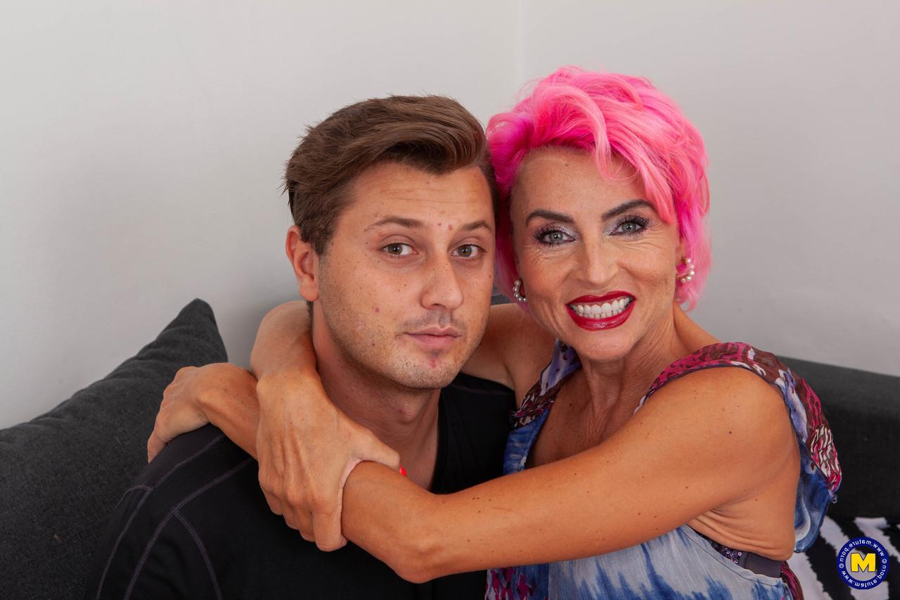 16P Pink haired cougar seduces the boy next door after he brings her groceries