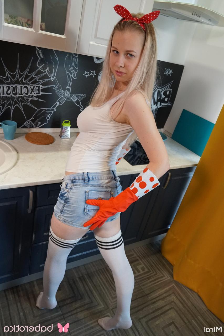 20P Russian kitty Mirai strips in the kitchen, shows her big tits & masturbates