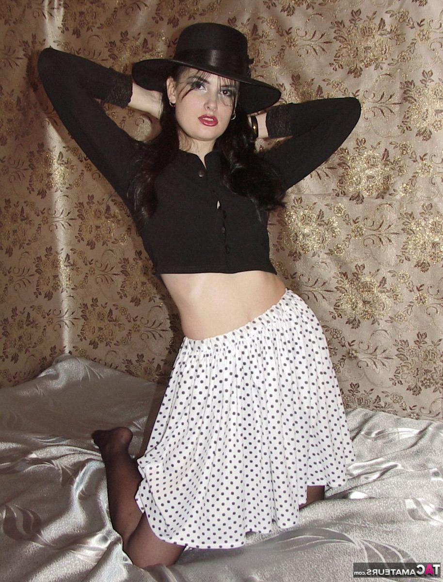 20P Sexy chick Susy Rocks removes a hat while going topless in black velvet gloves