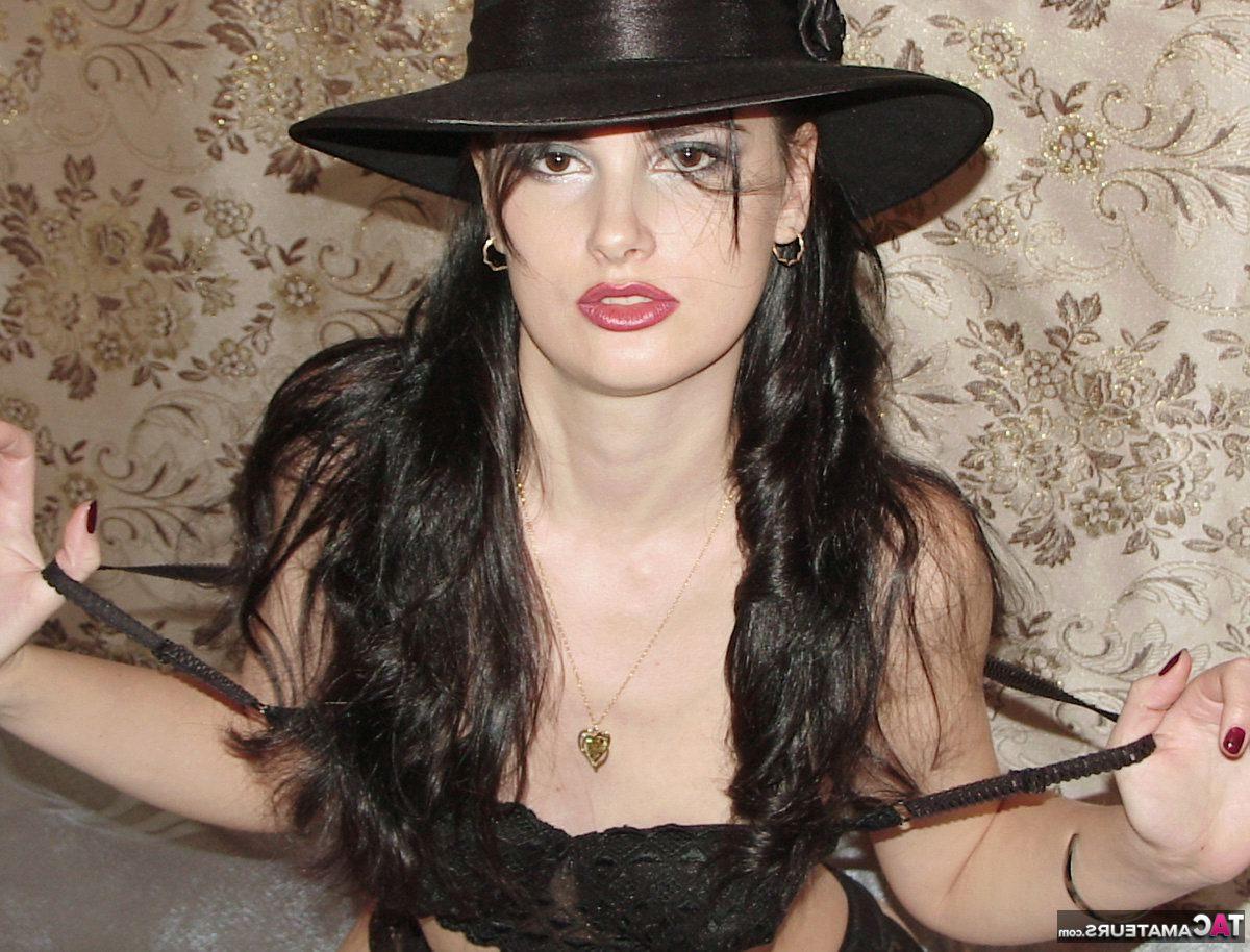 20P Sexy chick Susy Rocks removes a hat while going topless in black velvet gloves